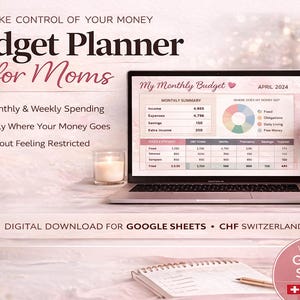 May include: A laptop displays a budget planner interface with financial data. The image includes text that reads "Budget Planner for Moms" and "Take Control of Your Money." A mug with "Dream Plan Achieve" is visible, along with a candle and a notepad.