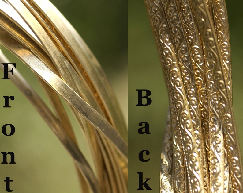 May include: Close-up of a stack of gold-colored metal wire with a decorative pattern on the back. The front of the wire is smooth and shiny. The words "Front" and "Back" are labeled on the image.
