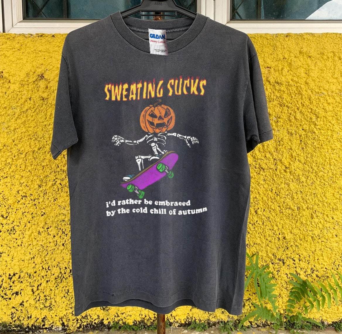 Discover Vintage Halloween Sweating Sucks Skull T-Shirt