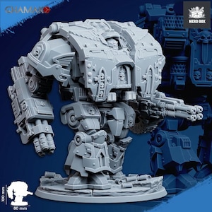 May include: A grey miniature war machine model with detailed armour, multiple weapon systems, and mechanical features. The model is approximately 10 cm tall and 8 cm wide, with a base. The Nerd Box logo is visible. The model is a detailed representation of a futuristic war machine.