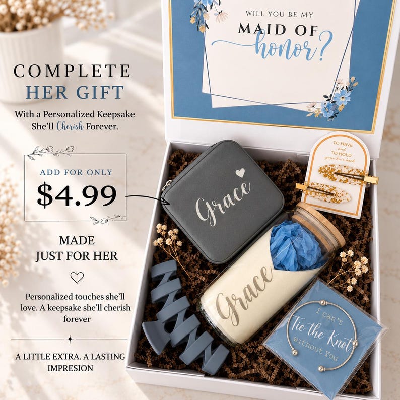 May include: A white gift box containing a gray square jewelry case with the name Grace, a glass tumbler with a bamboo lid and the name Grace, a blue hair claw clip, two gold-patterned hair clips, and a silver bracelet with the text I can't Tie the Knot Without You.
