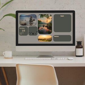 May include: A computer monitor displaying a desktop with a calendar, notes, and apps. The calendar shows Sunday, the 16th. The desktop background is a collage of nature photos.