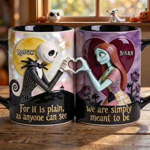 May include: Two ceramic mugs featuring Jack Skellington and Sally from The Nightmare Before Christmas. Jack is on a moon background, Sally on a heart. Text reads "For it is plain, as anyone can see" and "We are simply meant to be."