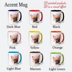 May include: A collection of white ceramic accent mugs with different colored interiors and handles. Each mug features a French Bulldog portrait with the name "Ovan" and a pink floral accent. Colors include dark blue, red, black, pink, yellow, orange, light blue, maroon, and light green.