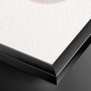 The image is a close-up of a black frame with a white background.