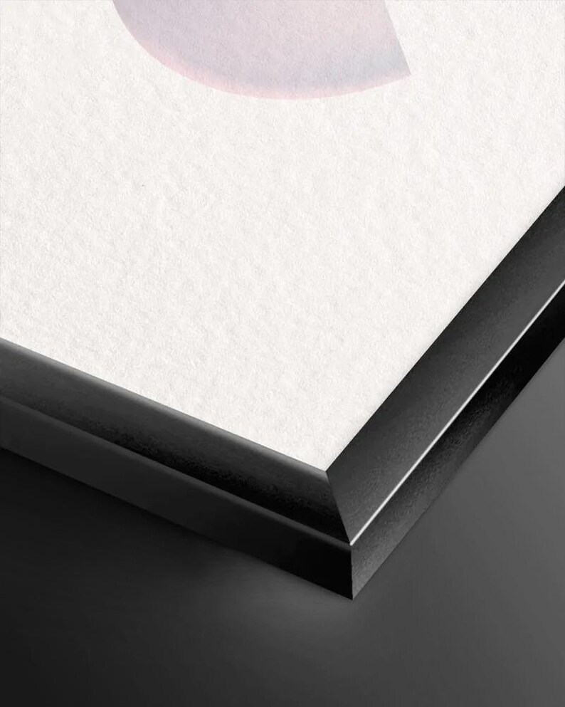 The image is a close-up of a black frame with a white background.