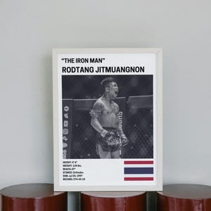 a poster of a fighter with the title "The Iron Man" and the name "RODTANG JITMUANGONON".