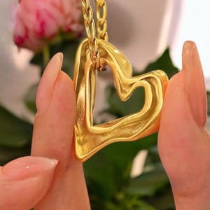Carved heart pendant necklace, original heart in gold or silver stainless steel, modern heart jewelry for women, romantic and unique gift idea