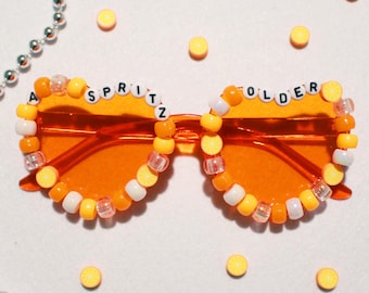Orange "A Spritz Older" Birthday Heart Sunglasses