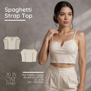 Op de afbeelding: Een beige spaghettitop met een V-hals wordt getoond. De afbeelding bevat ook een lijntekening van de top en de tekst "Spaghetti Strap Top". De tekst "20 IN ONE PATTERNS" is ook zichtbaar, samen met maatvoering.