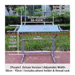 May include: A purple adjustable embroidery frame with a phone holder and thread rack. The frame's adjustable width ranges from 19.69 to 36.22 inches (50 to 92 cm). The frame is 59.06 inches (1.5 m) wide. The frame includes a scroll embroidery frame.