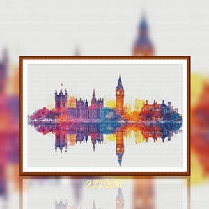 May include: A framed watercolor print of the London skyline, featuring the Houses of Parliament and Big Ben, reflected in the water below. The artwork uses a vibrant palette of blues, purples, oranges, and yellows. The text "ZZ7326" is visible at the bottom.