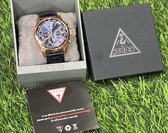 Reloj cronógrafo Guess Horizon W0380G5 para hombre, nuevo en caja abierta, color negro y dorado.