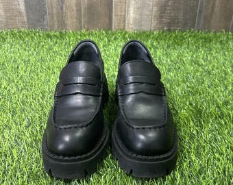 Mocasines Free People Lyra con suela gruesa en color negro, talla 37 (US 7).