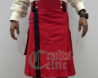 May include: A red kilt with a black vertical stripe and a red waistband. The kilt has decorative metal hardware and pleats. The image also shows the text "Crafts Celtic".