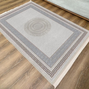 Classic Greek key area rug with medallion center, elegant washable carpet for traditional living room or formal home interiors