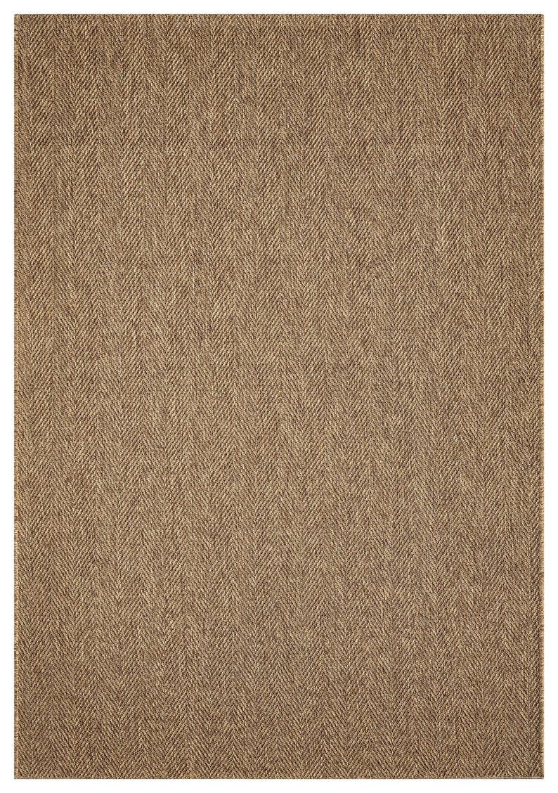 May include: A rectangular rug with a herringbone pattern. The rug is a warm, neutral brown color, with a woven texture. The pattern is made up of diagonal lines that create a V-shape.