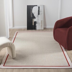 cream sisal rug, beige sisal rug, handmade border rug, red border rug, custom woven rug, natural fiber rug, pet friendly carpet, rustic home decor, durable sisal rug, modern area rug, easy clean floor rug, eco friendly sisal carpet, high quality woven rug
