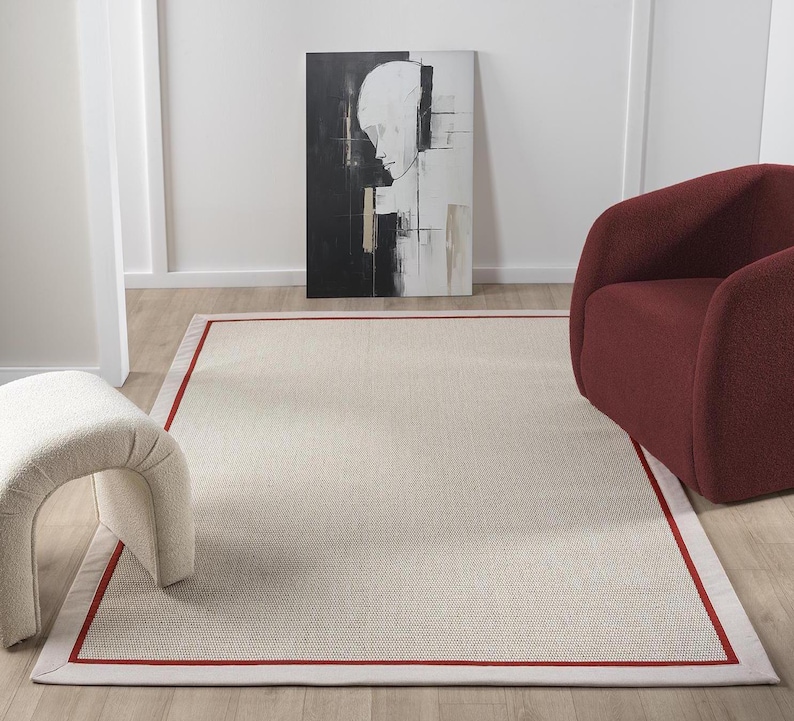 cream sisal rug, beige sisal rug, handmade border rug, red border rug, custom woven rug, natural fiber rug, pet friendly carpet, rustic home decor, durable sisal rug, modern area rug, easy clean floor rug, eco friendly sisal carpet, high quality woven rug