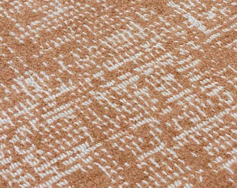 Alfombra plana de terracota: poliéster con textura suave, decoración minimalista moderna