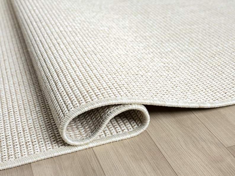 cream sisal rug,modern area rug,indoor outdoor rug,flatweave carpet,non shedding rug,pet friendly rug,easy clean carpet,custom size rug,neutral living room rug,modern boho rug,scandinavian decor rug,coastal style rug,durable hallway runner