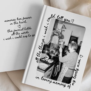May include: Two white journals with black text. One journal reads "memories live forever in the heart. This journal holds all the words I wish I could say to you." The other journal has a black and white photo and text that reads "all the things I wish I could tell you in loving memory of my lovely mom."