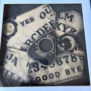 Tablero de ouija de Phasmophobia