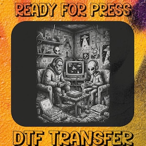 May include: A black and white DTF transfer print featuring the text READY FOR PRESS and DTF TRANSFER. The illustration depicts a sasquatch and an alien sitting in armchairs, wearing headphones, and playing video games on a television set.