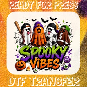 May include: A DTF transfer design featuring four cartoon ghosts dressed as sports balls, including baseball, basketball, soccer, and football. The text reads SPOOKY VIBES in green and orange. Includes a jack-o'-lantern, candy corn, and eyeballs.