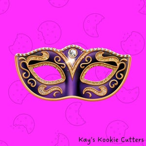 May include: A purple and gold masquerade mask with a jeweled top and intricate gold filigree design. The mask has a black interior and is set against a bright pink background with cookie-shaped designs. The text "Kay's Kookie Cutters" is at the bottom.