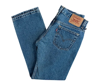 W31” L29.5" 505 Y2K Vintage Levi's: medium dark wash (31" measured waist = modern women’s size 28/29), JR tag