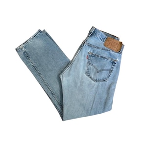90s True Vintage Levi&#39;s 501 Size 30/31 W33&quot; - mid to high rise straight leg blue jeans, light wash faded denim, USA made, W34 L28.5