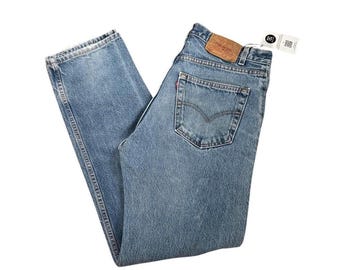 W33” L33.5” 505 Y2K USA Painted Levi’s Vintage Jeans: medium stonewash (33 inch measured waist = modern women’s size 30/31)