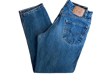 W32" L30.5" 550 Vintage Levi's: relaxed fit, straight leg, faded dark wash (modern women’s size 29/30), vintage levis 550