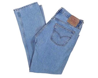 W32" L31” 501 90s USA Levi's Vintage Jeans: light stonewash (32" measured waist = modern women’s size 29/30)