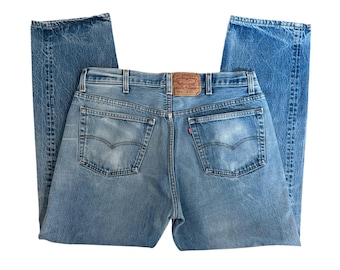 W36" L29.5" 501xx 90s USA Levi's: faded medium light wash (36" measured waist = modern women's size 33/34), vintage levis 501xx