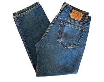 W31.5” L27" 501xx 90s USA Levi’s: faded dark wash (31.5" measured waist = modern women’s size 29), vintage levis 501xx