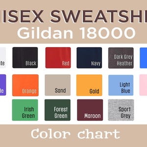 May include: Image of a color chart for a unisex sweatshirt. The chart displays various color swatches, including white, black, red, navy, dark grey heather, royal, purple, orange, sand, gold, light blue, light pink, Irish green, forest green, maroon, and sport grey.