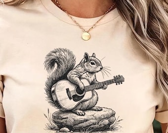 Maglietta con scoiattolo che suona la chitarra - Comfort Color® - Maglietta con musica folk indie giocosa, maglietta rustica con festival della fauna selvatica, maglietta con scoiattolo carino