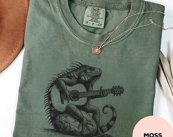 Maglietta con iguana che suona la chitarra - Comfort Color® - Maglietta per gli amanti della musica tropicale, maglietta acustica dell'isola, regalo con vibrazioni reggae, maglietta con schizzo di iguana