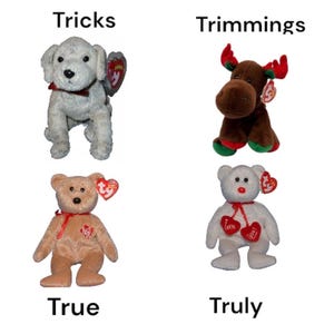 May include: Four plush toys are displayed, including a white dog, a brown moose with red antlers, a tan bear, and a white bear with heart-shaped accents. The toys have tags and are labeled "Tricks", "Trimmings", "True", and "Truly".