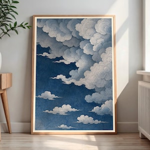 May include: A rectangular wall art print featuring a deep blue sky filled with intricate, swirling white cloud formations. The clouds are rendered with fine, detailed line work, creating a textured appearance against the solid dark blue background.