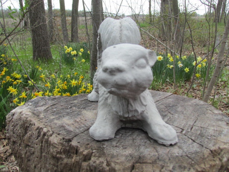 cement squirrel statue