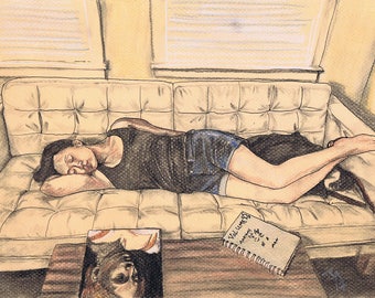May include: A woman is sleeping on a white couch with a black tank top and denim shorts. A notebook with the text "Val Unre Day" is on the couch next to her.