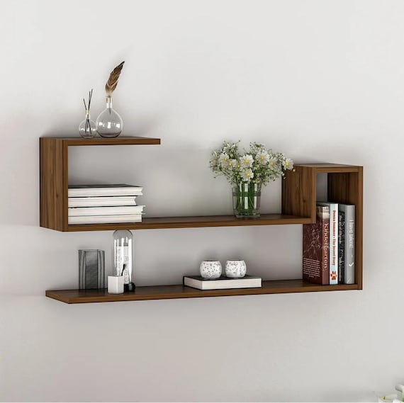 幾何学的デザインのシェルフ 幾何学的な壁掛けシェルフ：モダンなMDFフローティングブックシェルフ