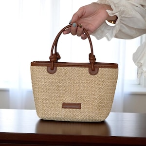Sac de plage en paille pour femme | Sac à main tissé à bandoulière seau d'été | Sac à main bohème à bandoulière réglable | Fourre-tout pour les vacances à la mer | Sac tendance 2025