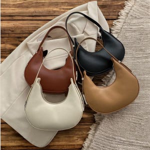 Sac demi-lune croissant | Sac à bandoulière en cuir végétalien | Dumpling design tendance pour femme | Petit sac à bandoulière | Sac zippé élégant | Cadeau pour elle