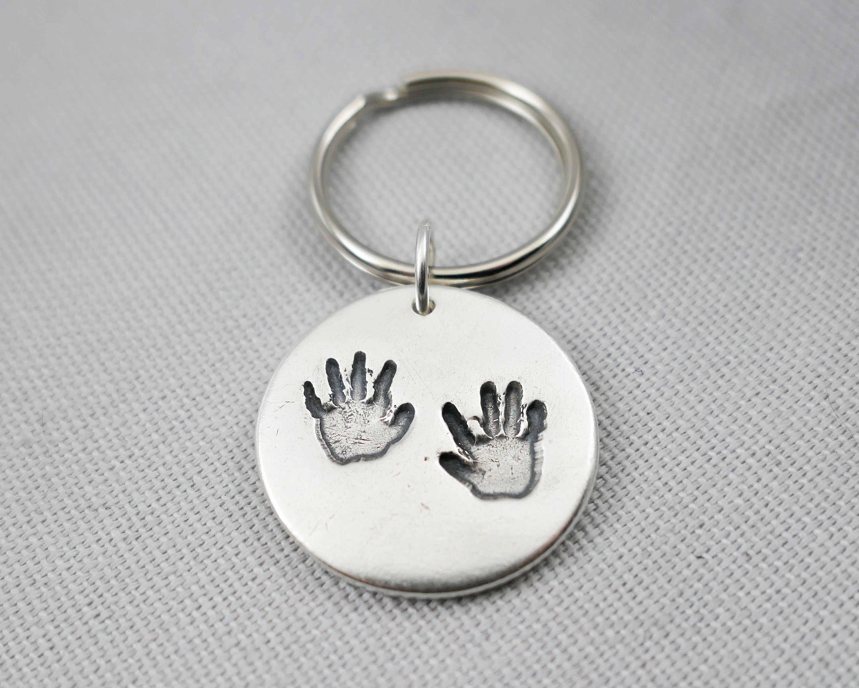 Baby handprint best sale keyring
