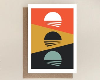 May include: Abstract art print with three circles in a vertical stack. The top circle is white with a red background, the middle circle is black with a yellow background, and the bottom circle is teal with a black background. Each circle has a horizontal line across the center.
