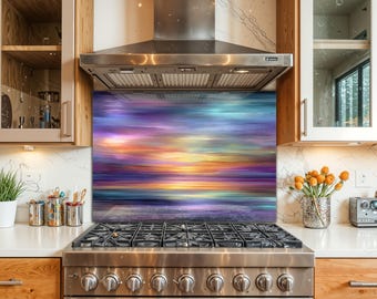 May include: A stainless steel gas range with a colorful glass backsplash featuring a sunset scene in shades of purple, blue, and yellow. The kitchen has wooden cabinets and a stainless steel range hood.